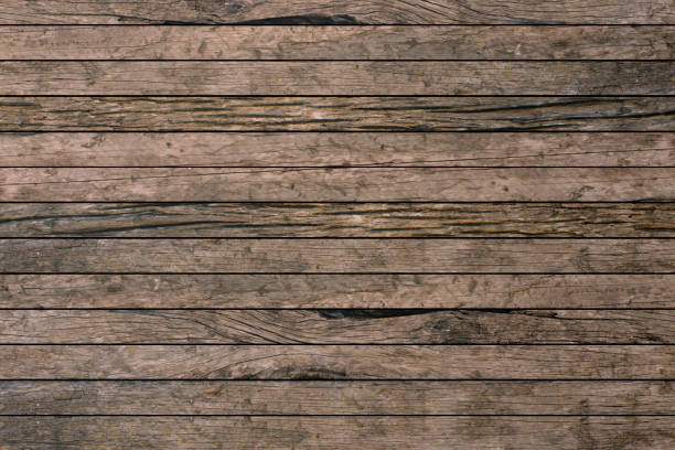 istock vintage aged brown wooden stripe backgrounds texture 1022721106