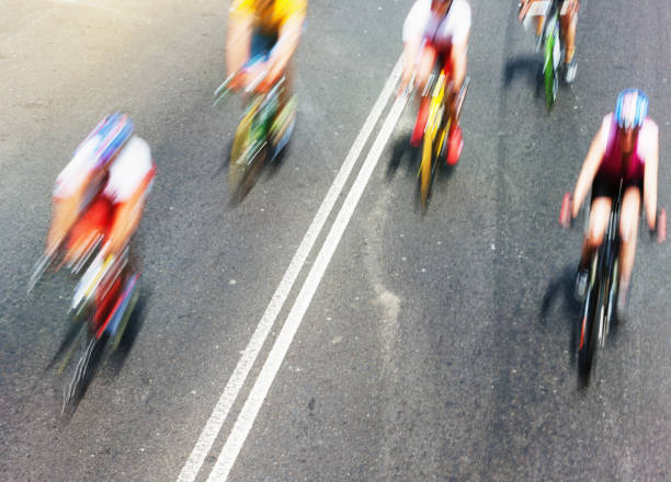 istock Speed blurs a group of racing cyclists 1022723220