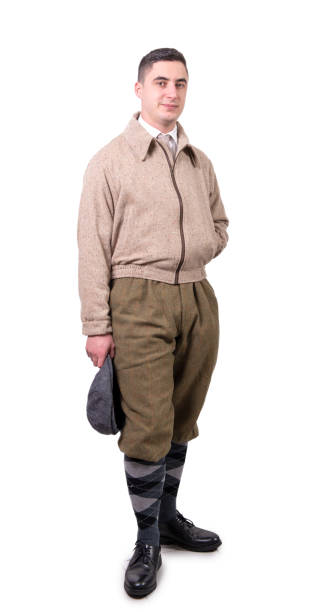 istock a young man in vintage clothes with hat, 1930 style, on white 1022726968