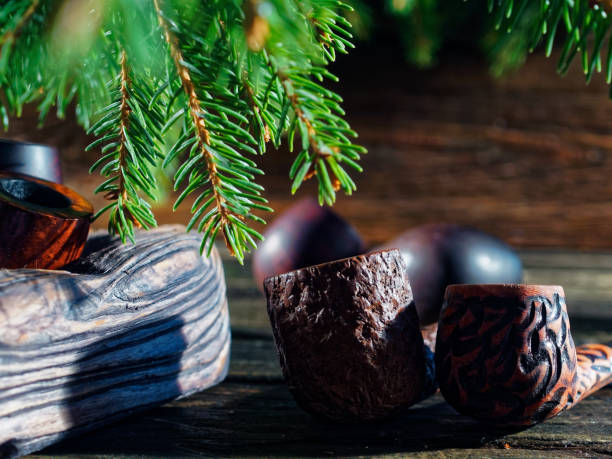 istock Smoking pipes under the Christmas tree 1022727890