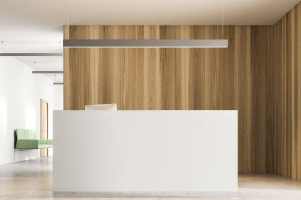 istock White reception counter in wooden office 1022735570
