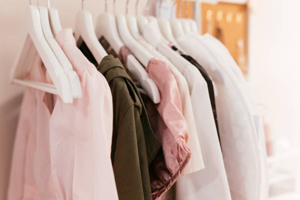 istock Women cloths on hangers in a row. 1022739506