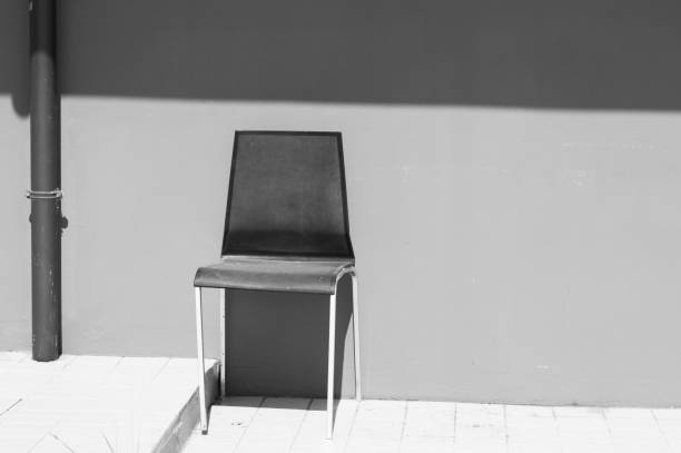 istock Isolated chair and wall background (Pesaro, Italy, Europe) 1022741840