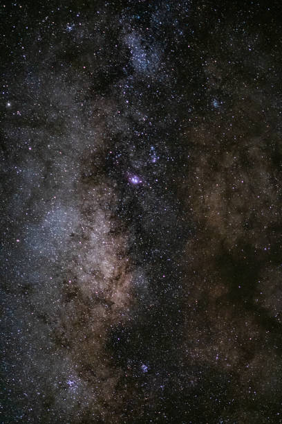 istock milky way galaxy, Long exposure photograph, with grain. 1022742638