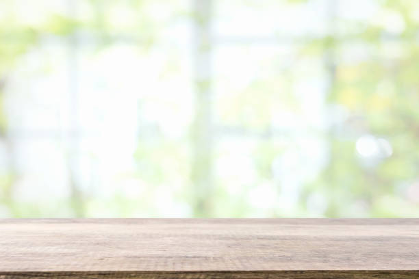 istock Empty wooden table and window room interior decoration background, product montage display,can be used for display or montage your products.Mock up for display of product. 1022749414