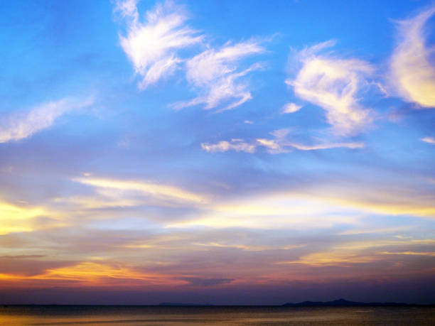 View of the seashore during sunset time with blue sky and natural background. Selective focus.