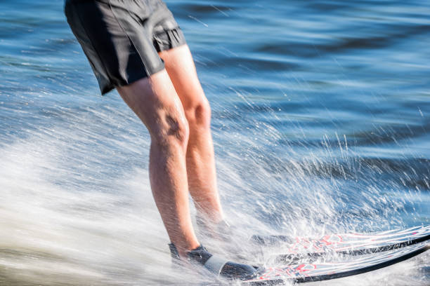 istock Surfer slipping on a board covered by splashed water. 1022753592