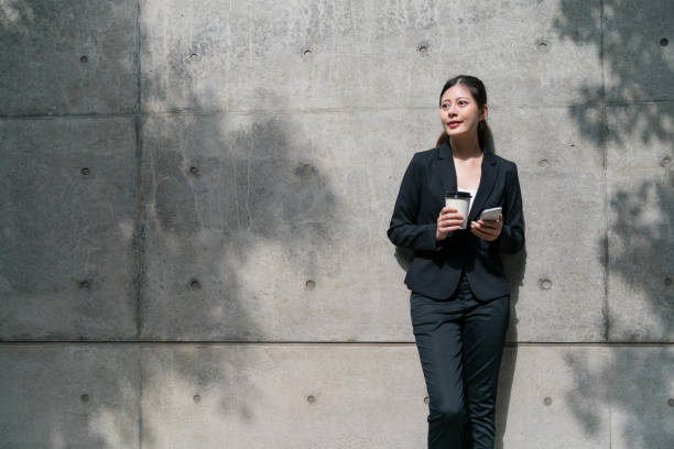 istock Office lady breathing fresh air outdoors 1022759726