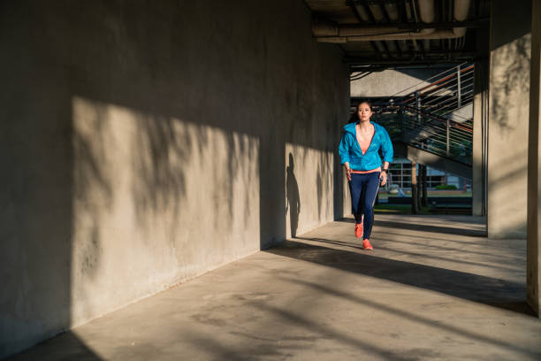 istock Woman active exercise on street outdoor. 1022768610