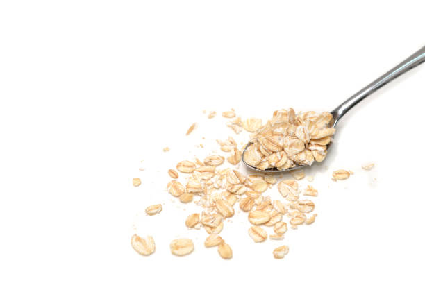istock Dry rolled oatmeal on white background 1022775086