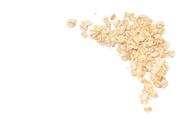 istock Dry rolled oatmeal on white background 1022775116