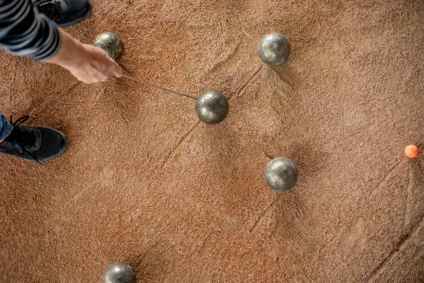 istock Senior Woman Marking Where Bocce Ball Has Stopped 1022775576