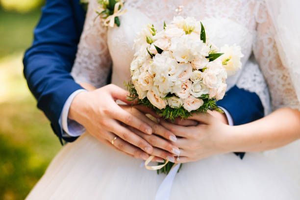 istock nice wedding bouquet in bride's hand 1022781070