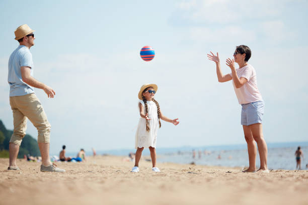 istock Playing ball on the beach 1022781566