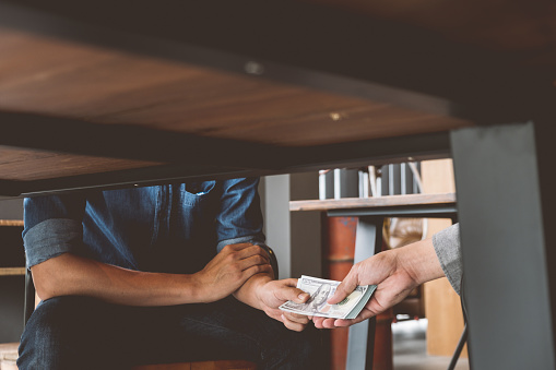 Table Corruption Bribery Hands Passing Money Under Table Corruption And Bribery Concepts ...