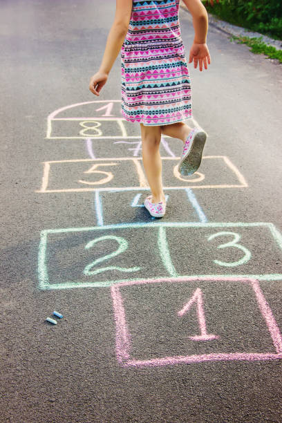 istock street children's games in classics. Selective focus. 1022800492
