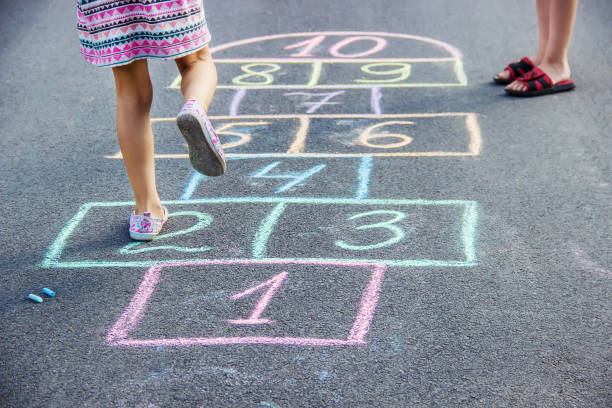 istock street children's games in classics. Selective focus. 1022801126