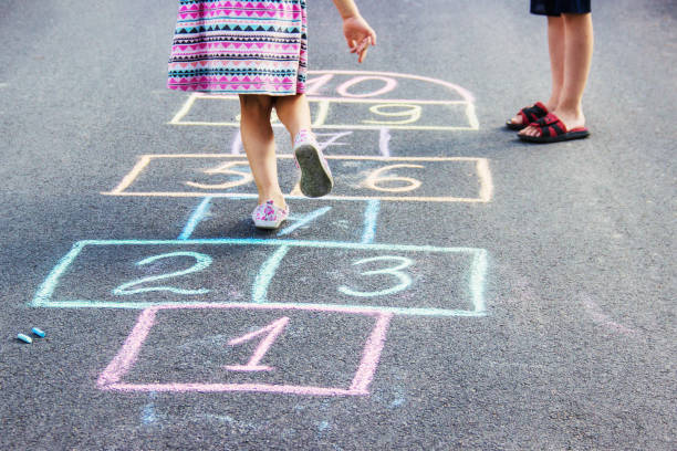istock street children's games in classics. Selective focus. 1022801402