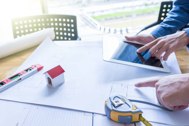 istock Team of engineers working together in a architect office. 1022804066