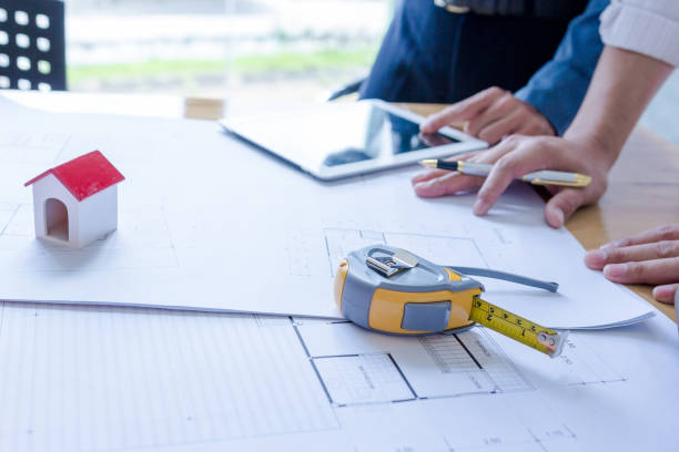 istock Team of engineers working together in a architect office. 1022804086