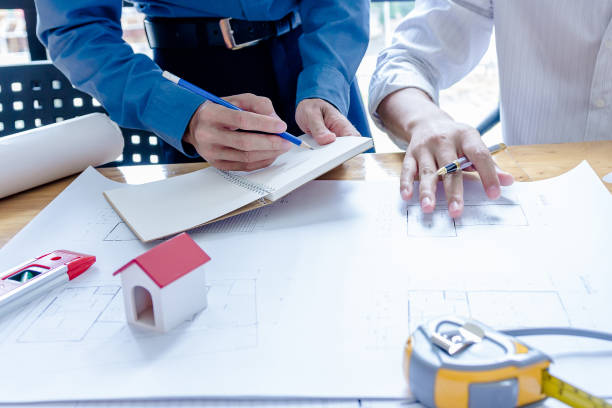 istock Team of engineers working together in a architect office. 1022804106