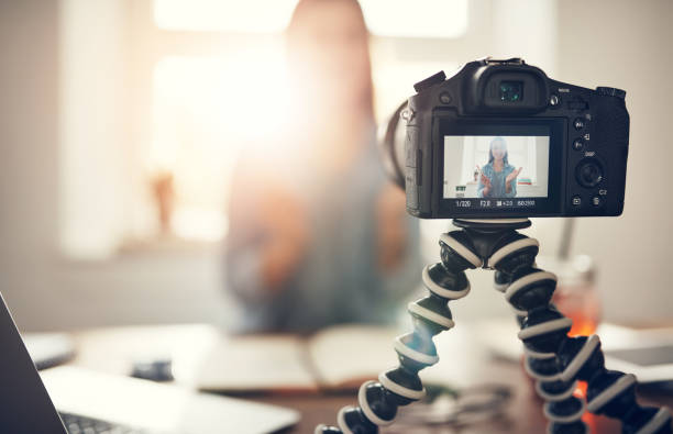istock Woman recording vlog and gesturing with hands 1022808218