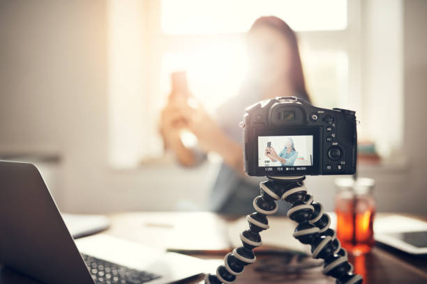 istock Woman taking selfie with smartphone recording vlog 1022808234
