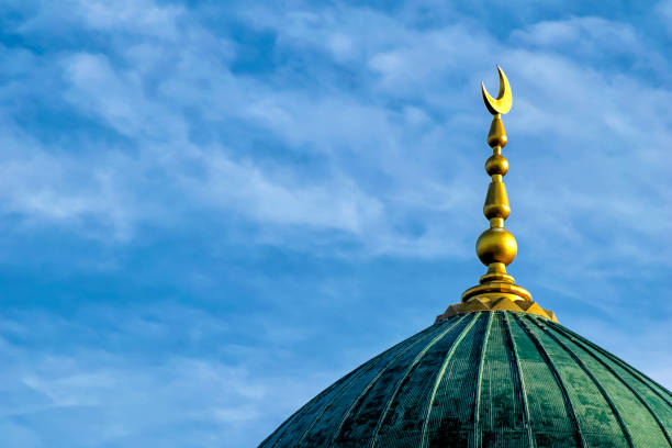 istock Crescent moon at a top of a mosque. 1022808804