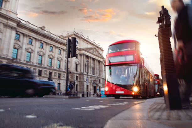 Tourists enjoying the ride on a Tour Bus in London