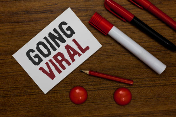 istock Writing note showing Going Viral. Business photo showcasing image video or link that spreads rapidly through population White paper markers wooden background communicating ideas messages. 1022820348