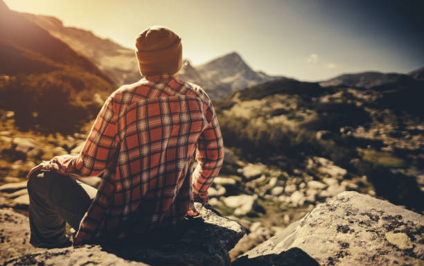 istock Sitting alone in the mountains at sunset 1022824704