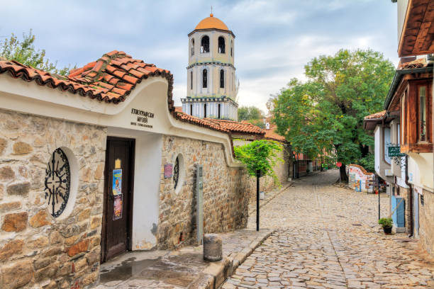 Beautiful cityscape of old town Plovdiv, Bulgaria, the medieval part of the city, with the Kuyumdzhioglu house, Regional Ethnographic Museum, and the Church of St Constantine and Helene