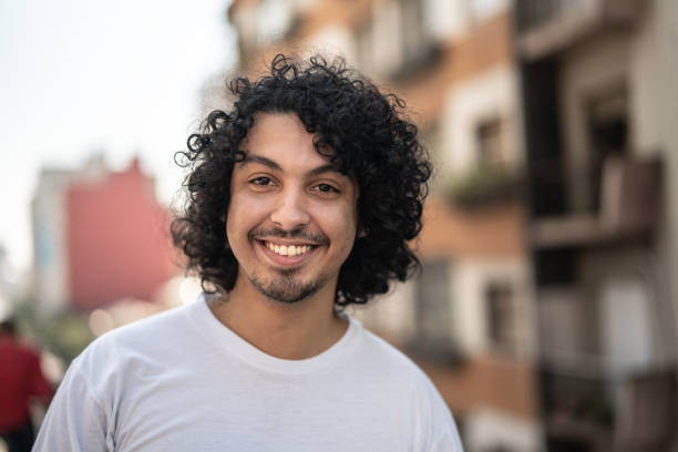 istock Cute Young Men with curly hair Portrait 1022828066