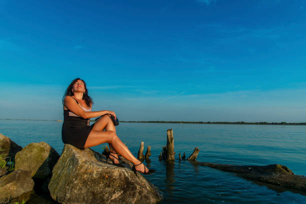 istock Lady in Black Dress at Danube 1022828132