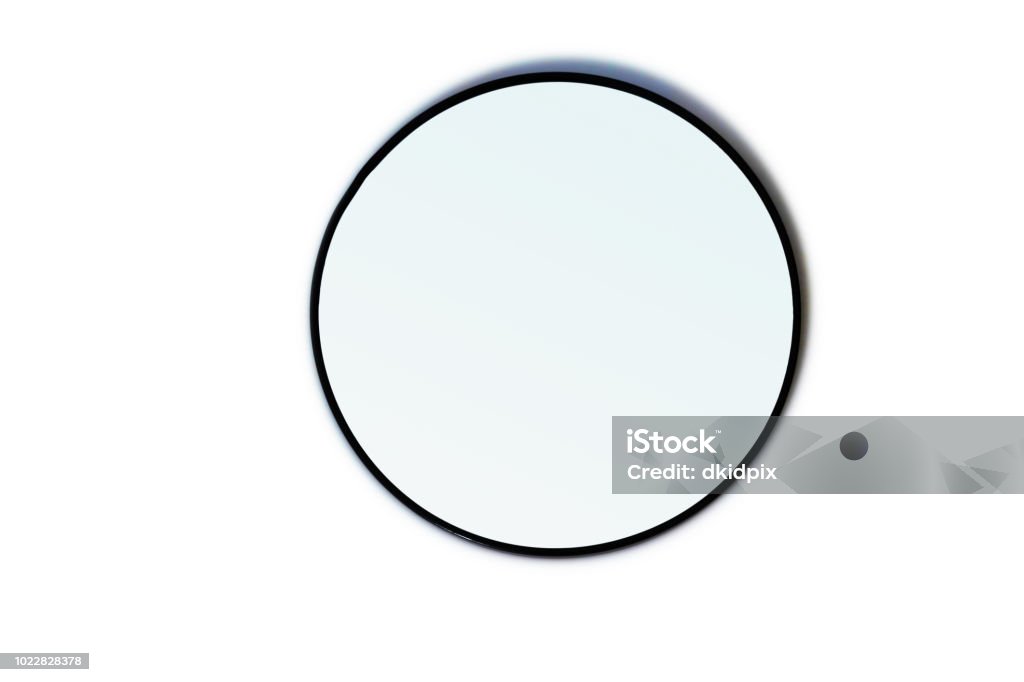 Mirror A gradient mirror laying on a white table. Mirror - Object Stock Photo