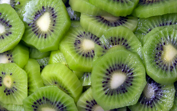 istock Background of sliced kiwi layered 1022832058