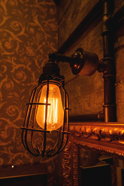istock Vintage light bulbs with glower filament. Old fashioned lantern. Incandescent lamp, retro design. 1022833786