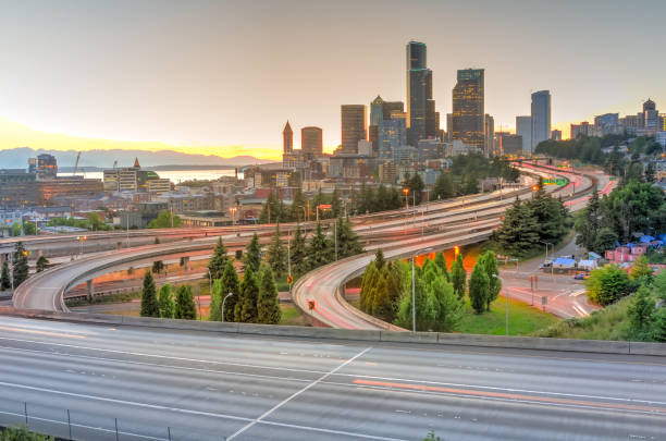 istock Seattle skylines and homeless tent with traffic at rush hour 1022836992