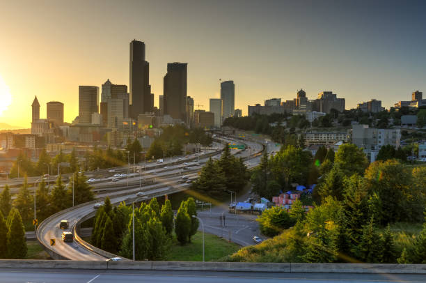 istock Seattle skylines and homeless tent with traffic at rush hour 1022837714