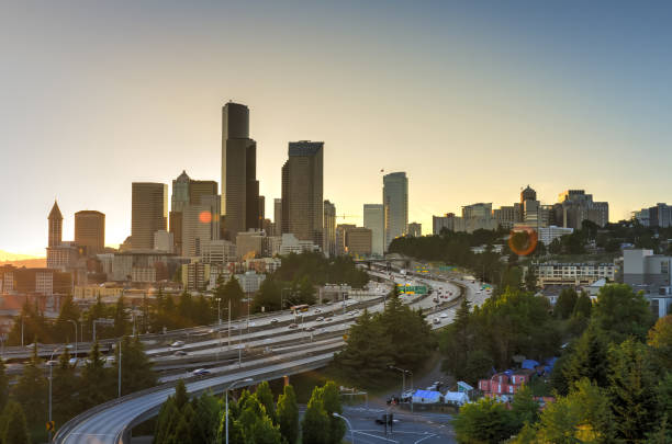 istock Seattle skylines and homeless tent with traffic at rush hour 1022837804