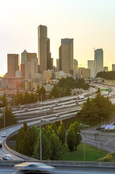istock Close-up Seattle skylines and I-90, I-5 highway traffic at sunset 1022837896
