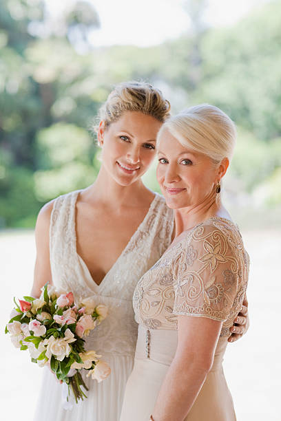 Mother And Bride Hugging Stock Photo - Download Image Now - Mother Of The  Bride, Mother, Bride - Istock