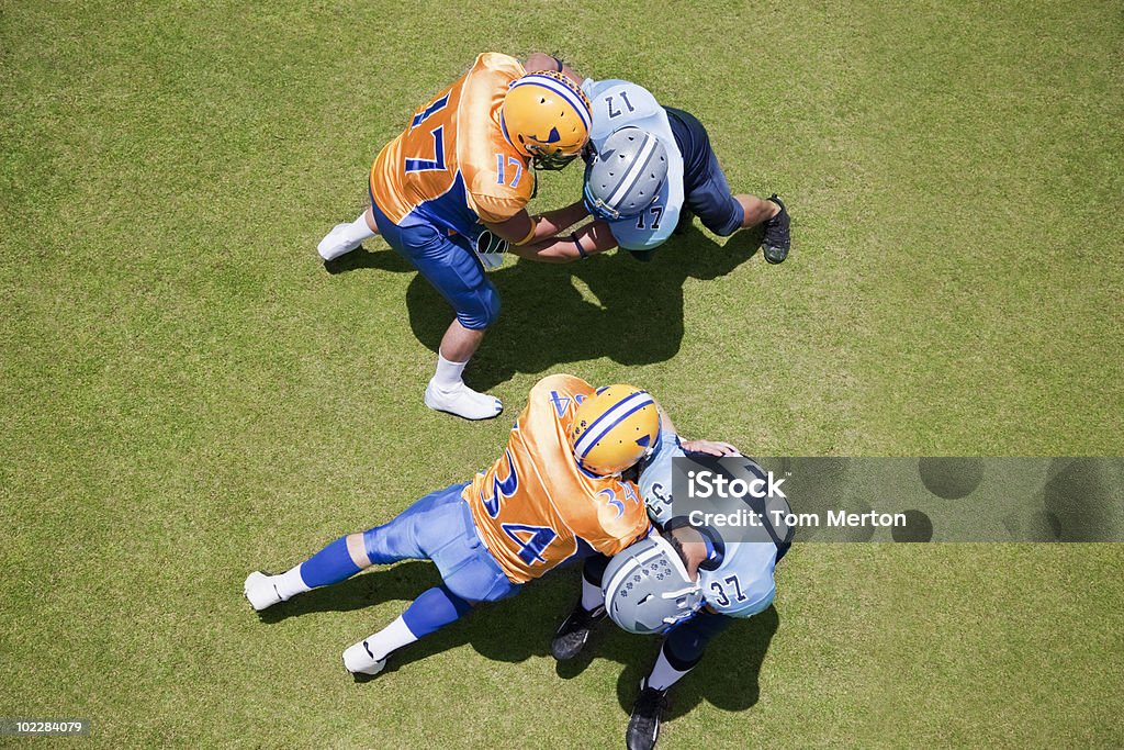 Calcio giocatori di gioco del calcio - Foto stock royalty-free di Football americano