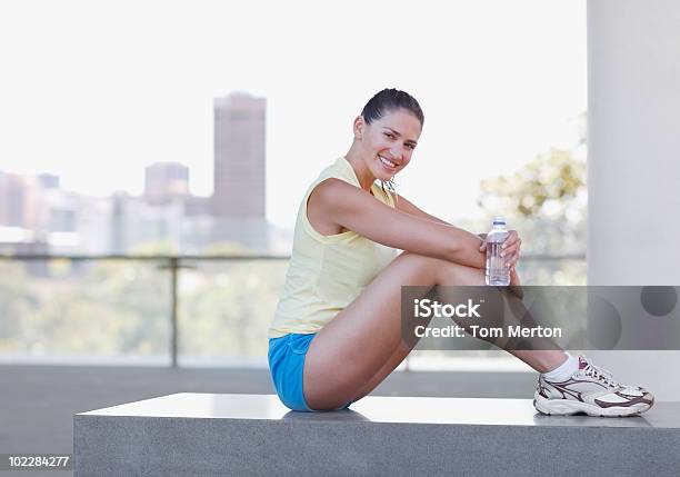 Woman Drinking Water After Exercise Stock Photo - Download Image Now - 30-34 Years, 30-39 Years, Adult