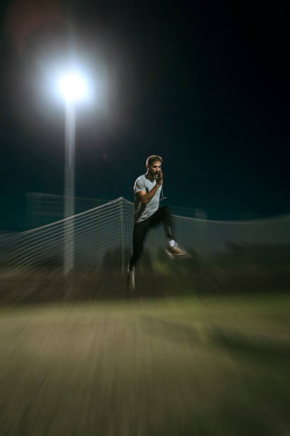 istock Young man running fast on playing field 1022847278