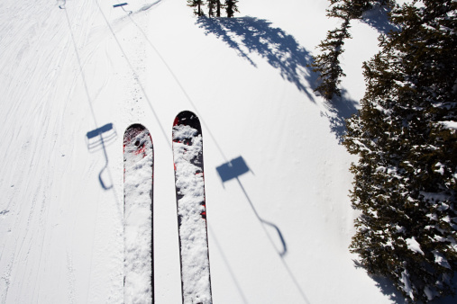 Skis of skier on ski lift