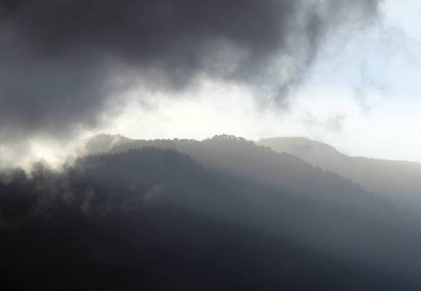 istock mountains with dramatic black storm clouds with shadows in tenerife 1022854122