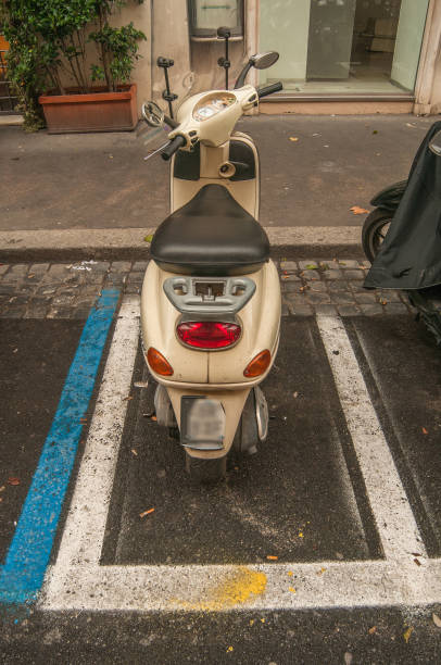 istock White Motorbike at parking, Rome 1022854818