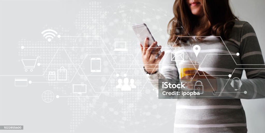 Woman using mobile payments online shopping and icon customer network connection. Digital marketing, m-banking and omni channel. Digital Display Stock Photo