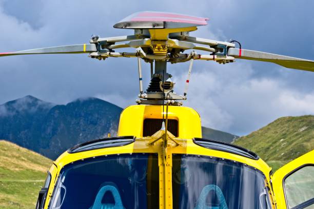 istock Yellow helicopter close up on the rotors 1022860890